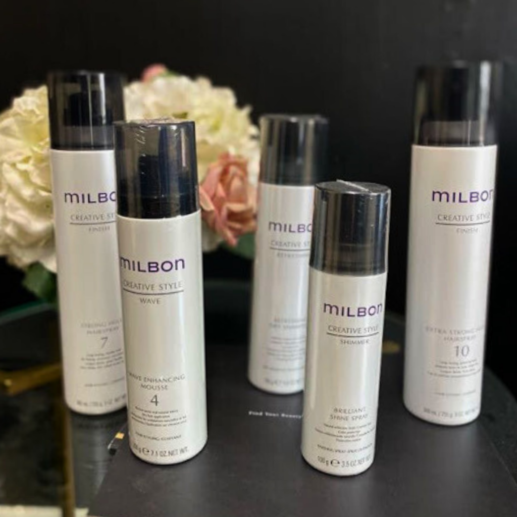 Sprays Milbon at Salon Veritas in Midtown Raleigh Near North Hills